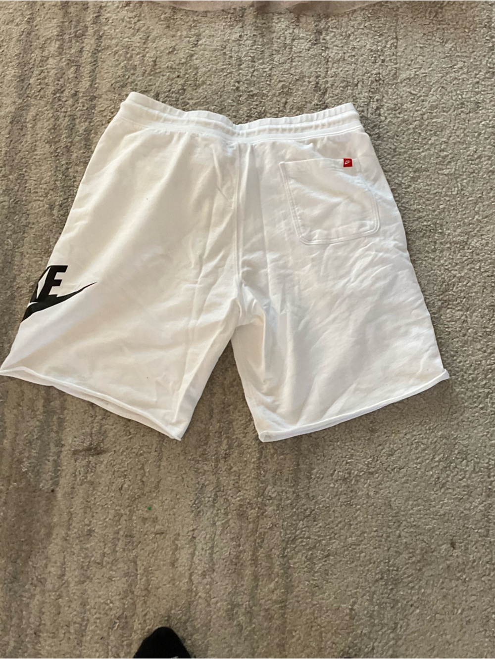 Nike White Athletic Shorts with Black Swoosh